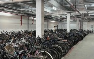 “早晨9点基本就停满了”！北京的全国首座非机动车立体停车楼，什么样？收费贵吗？